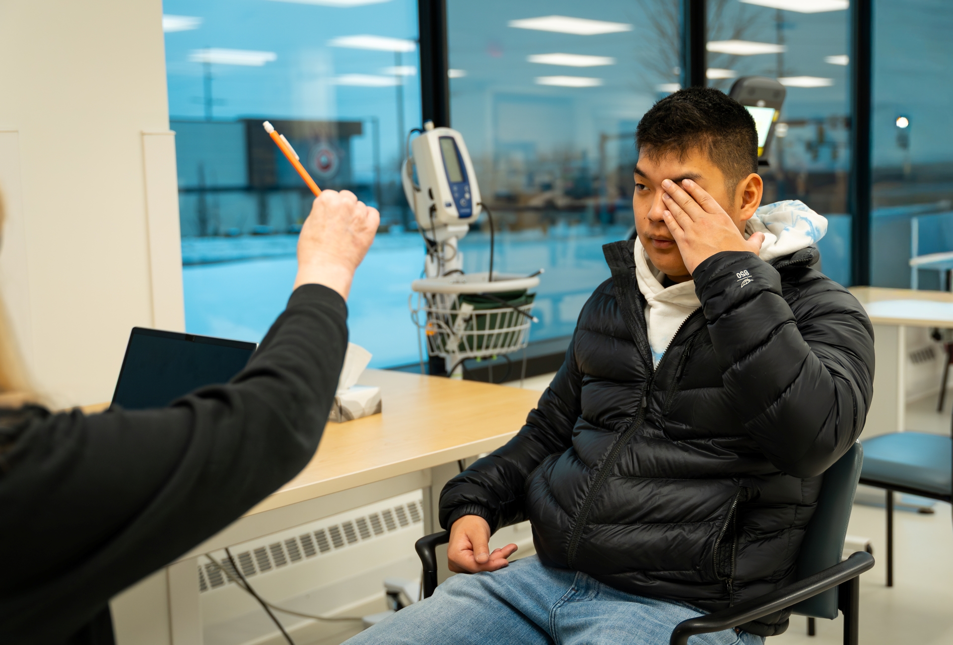 Occupational Therapist at UC Health works with patient