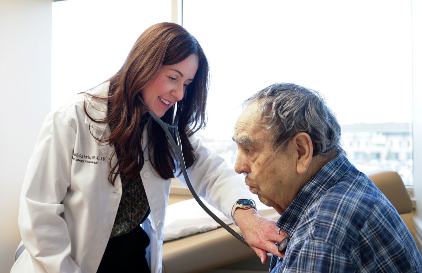 Physician examines a patient. 