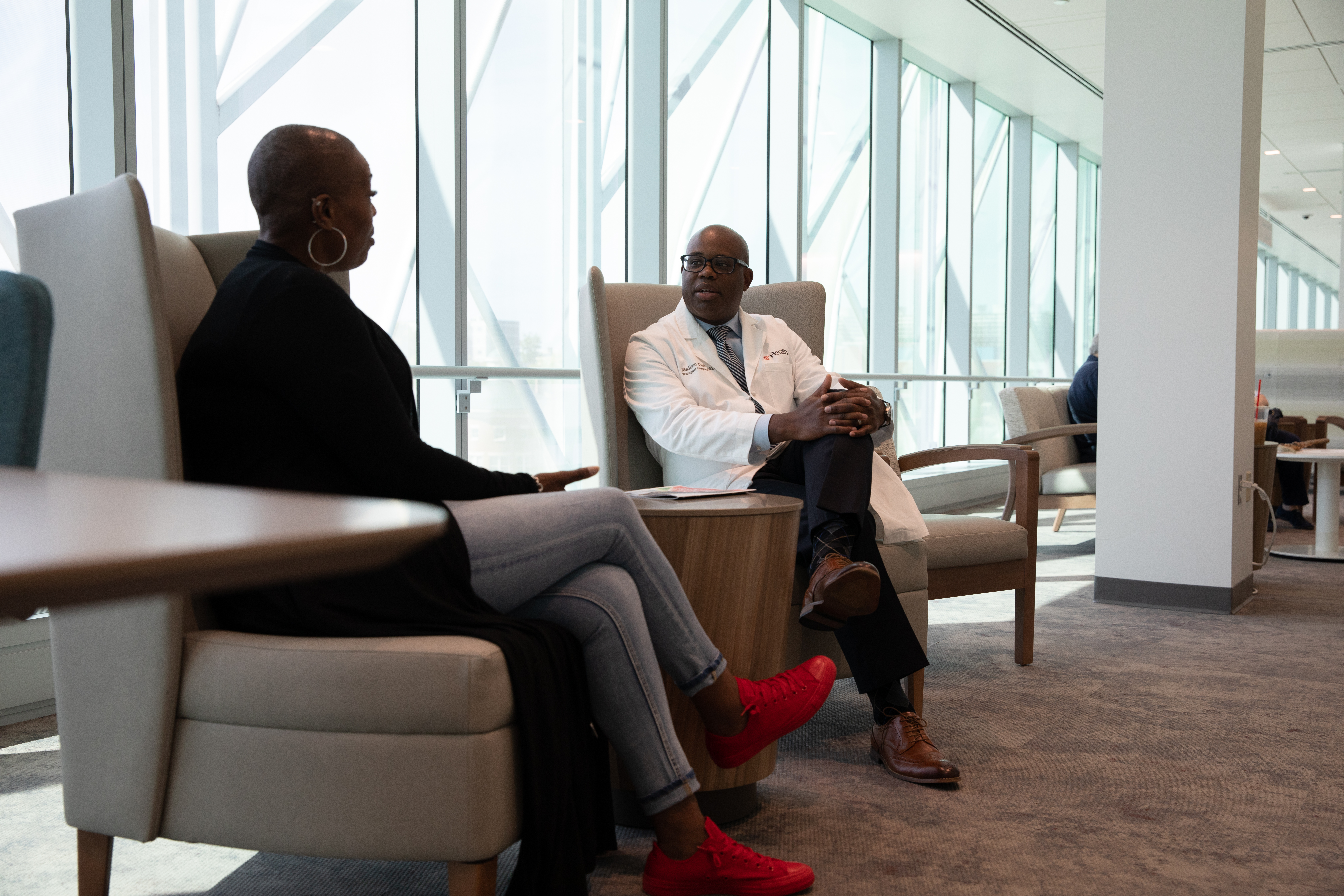 Dr. Cuffy meets with patient