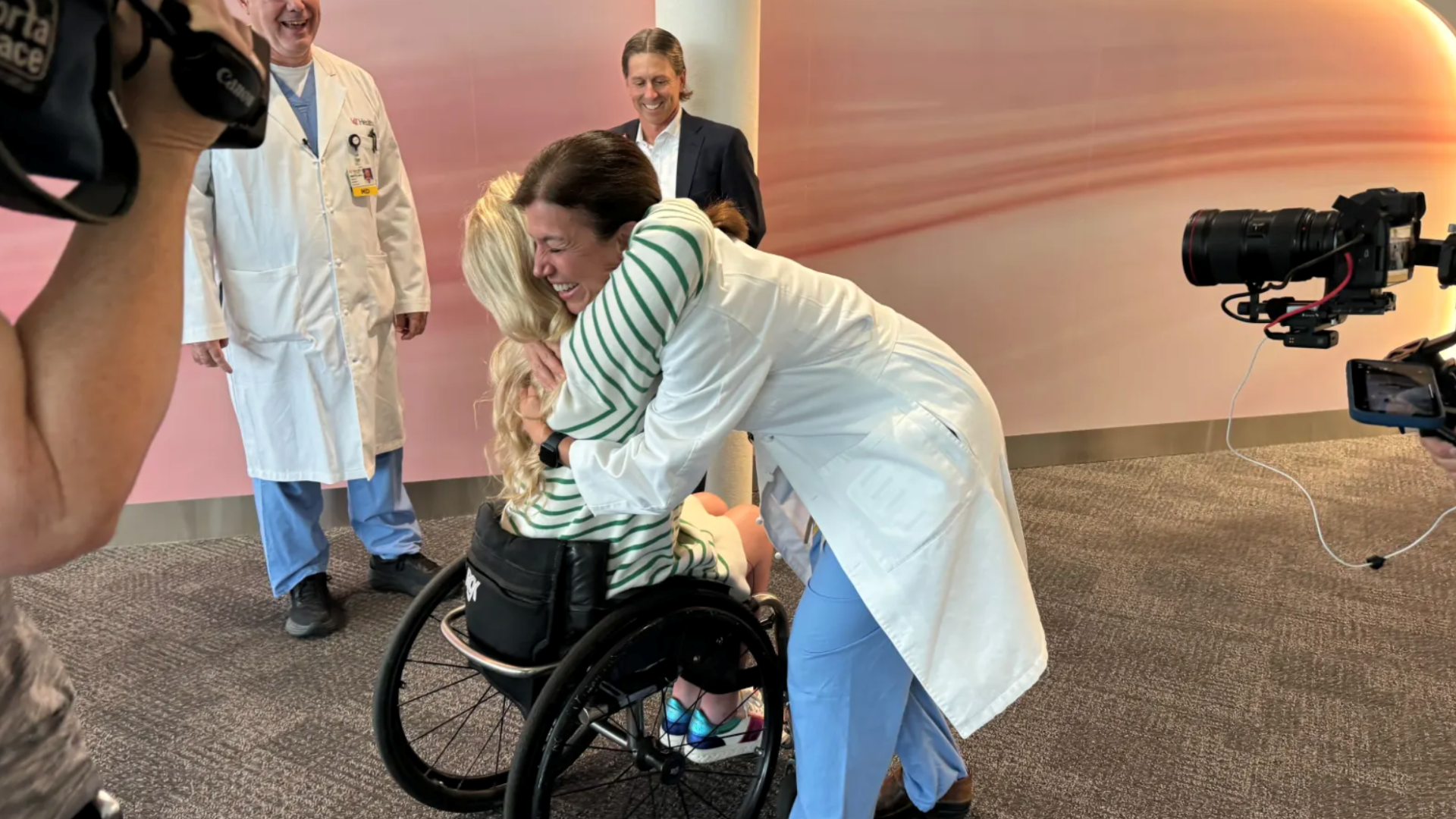 Sophie greets her surgeon Dr. Amy Makley, Director of Trauma at UC Health.