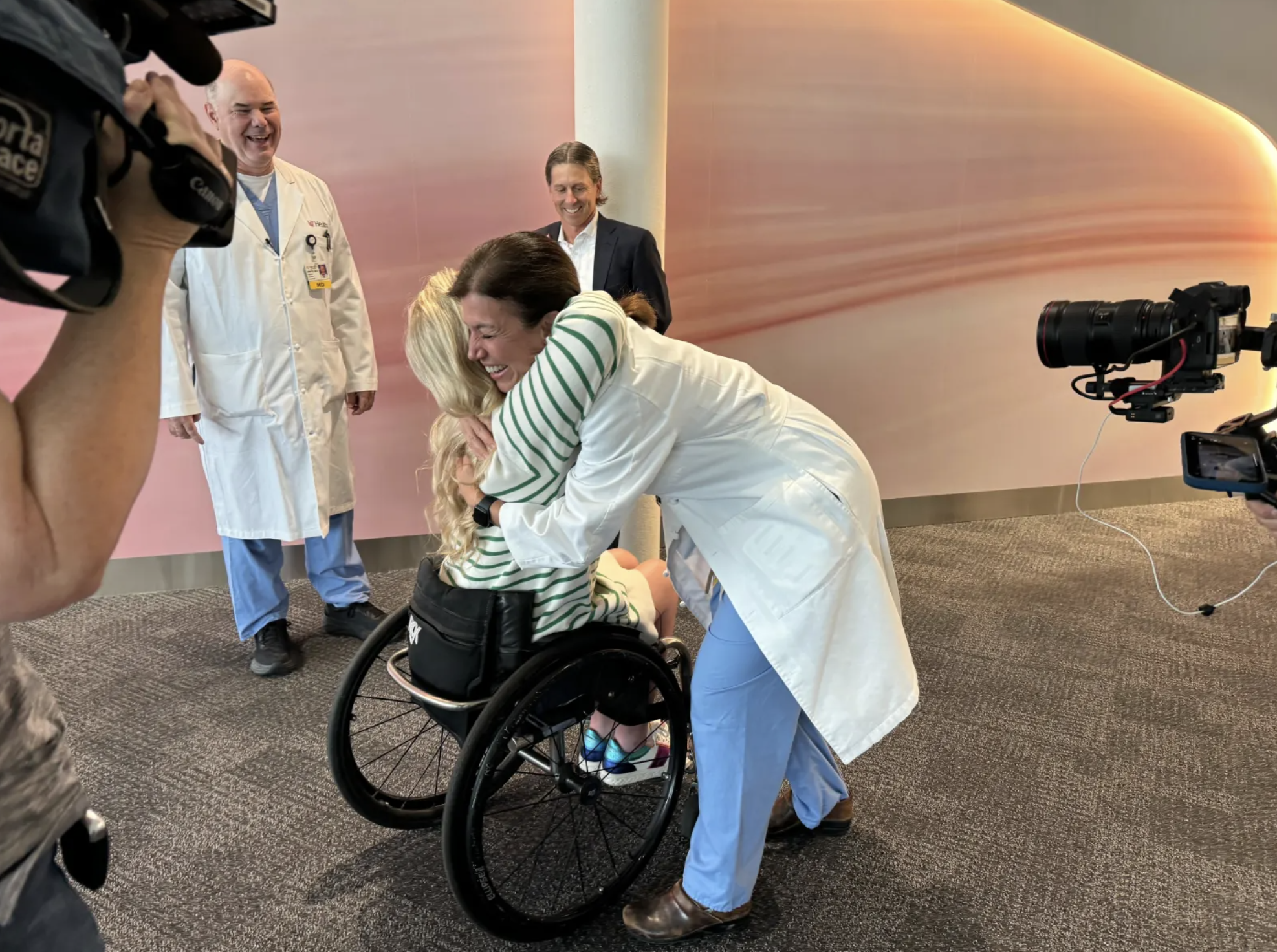 Sophie greets her surgeon Dr. Amy Makley, Director of Trauma at UC Health.