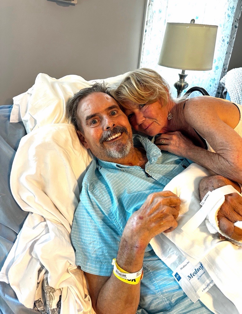 Chris Aldred with his wife in the University of Cincinnati Medical Center ICU. 