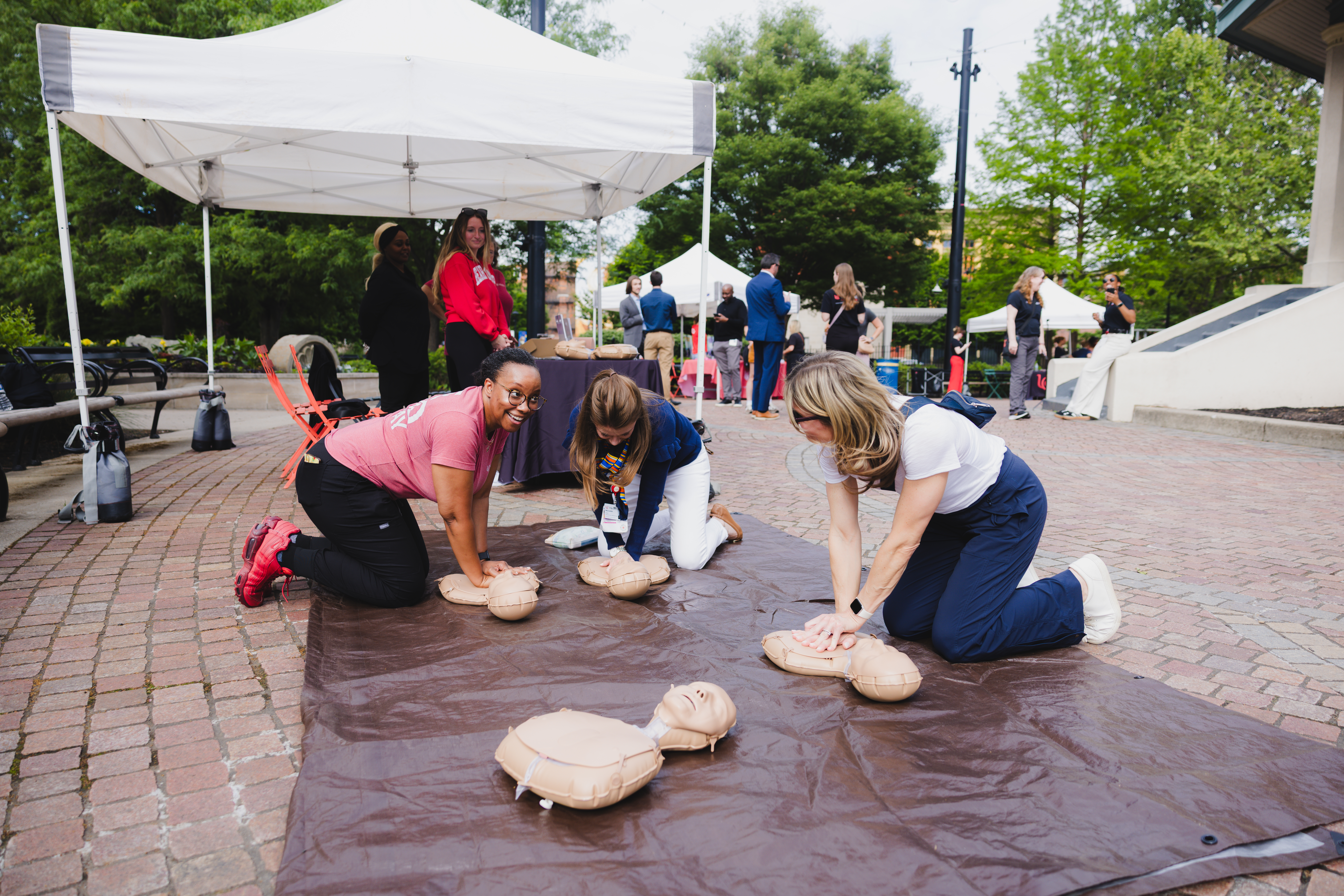 CPR on a manikan during an education class.