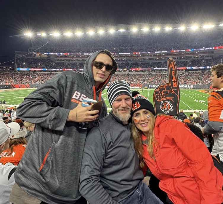 Peter Crable at a Cincinnati Bengals game with his wife and son. 