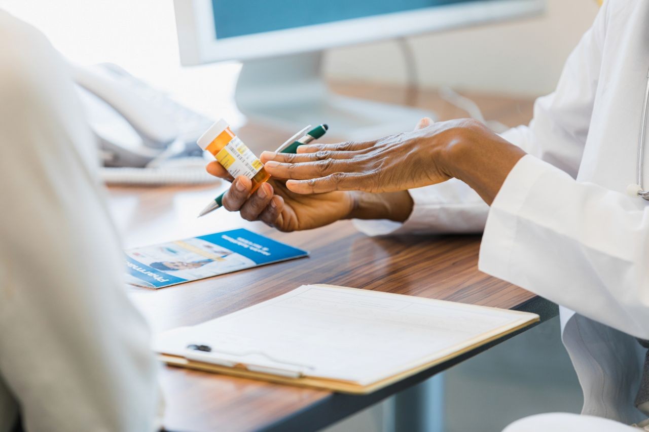 Physician explains a prescription. 
