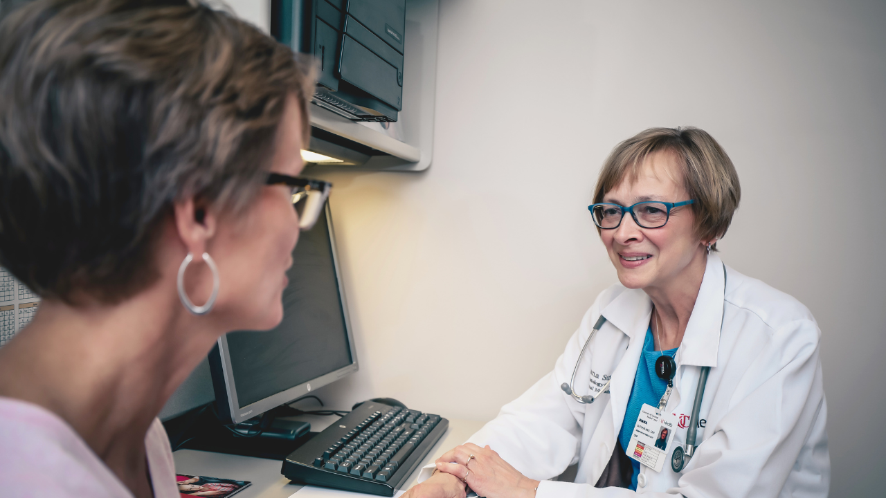 Physician talks with a patient. 