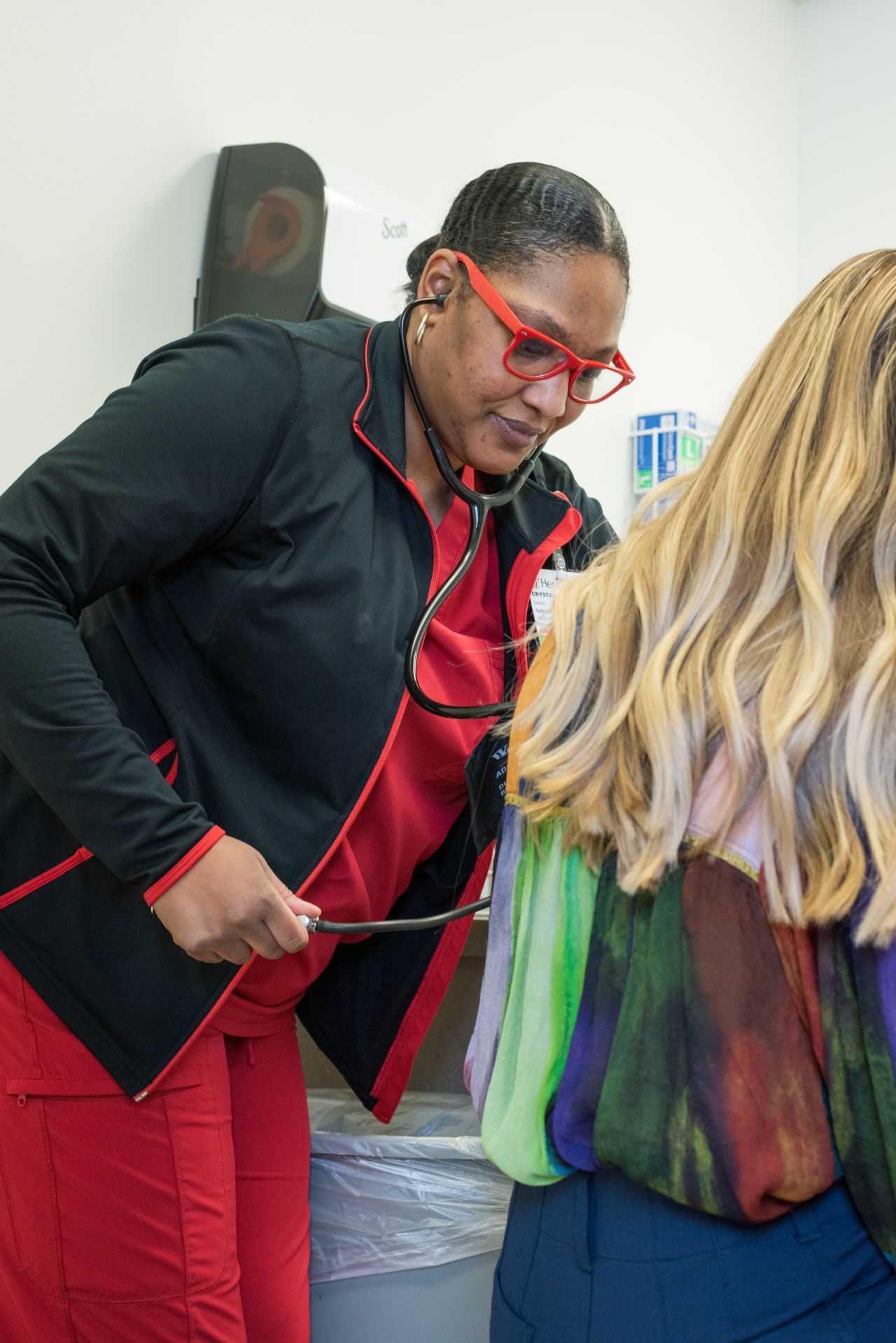 Physician attends to a patient. 