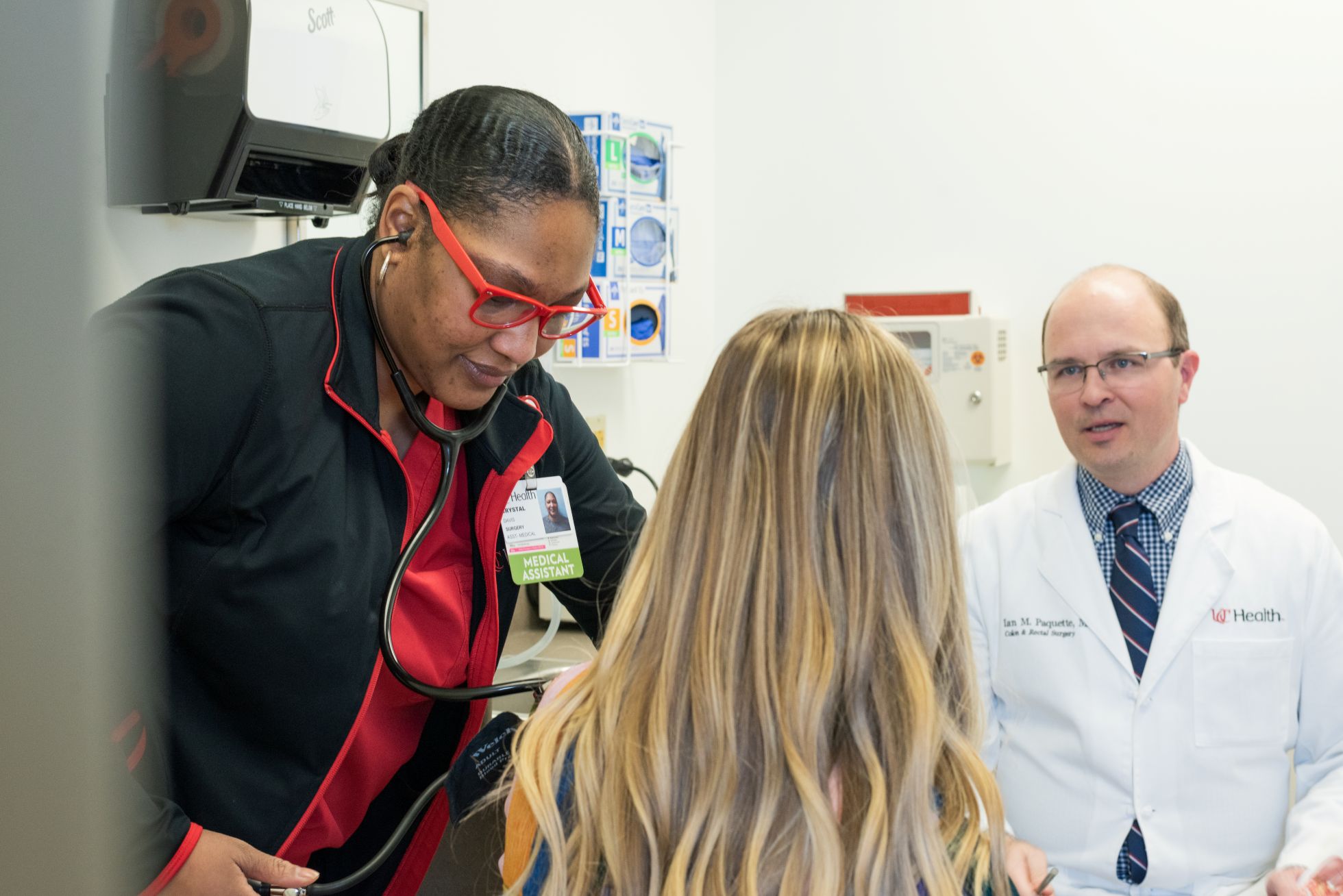 Physician talks with a patient. 