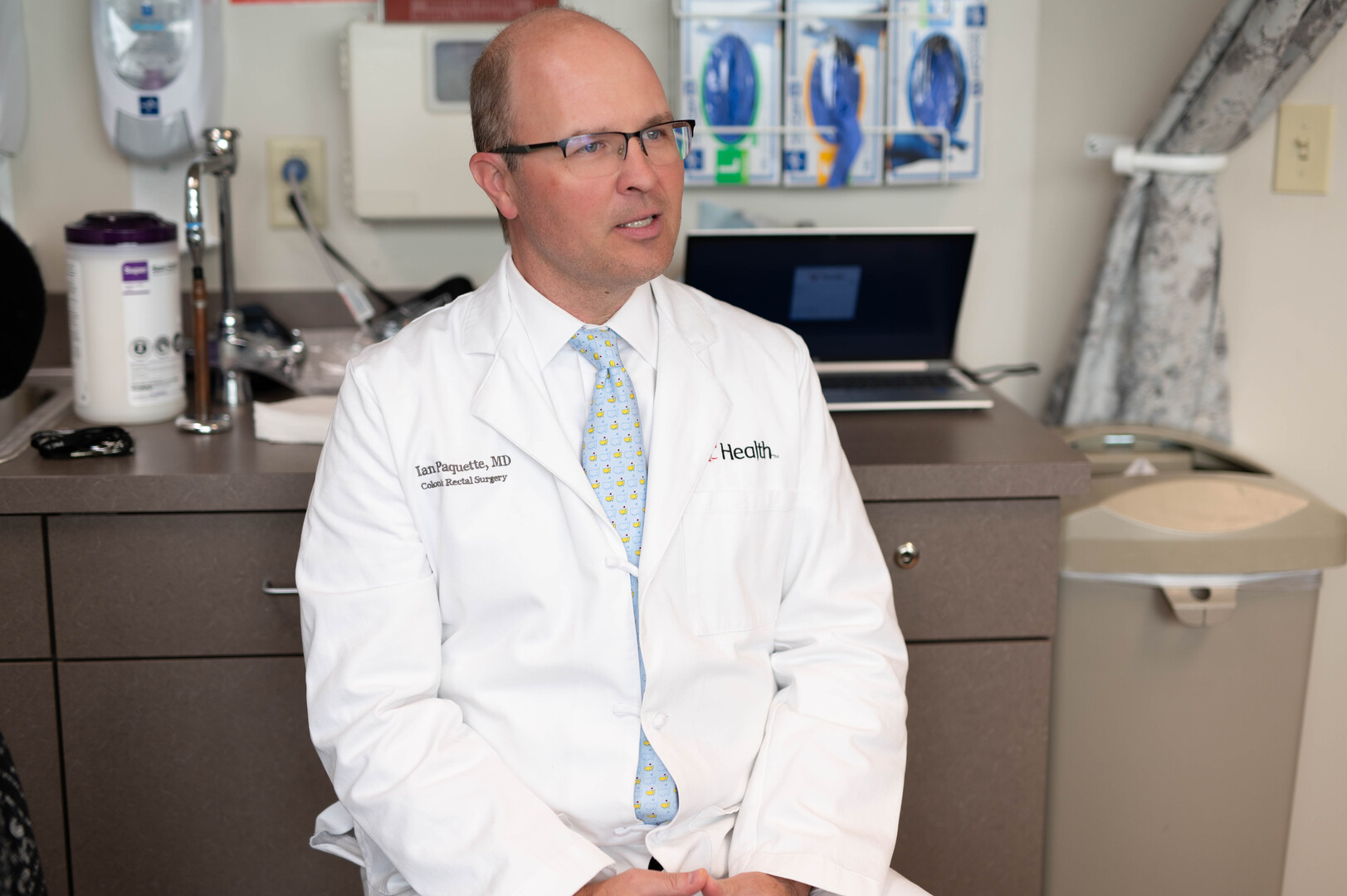 Doctor smiling at a patient. 