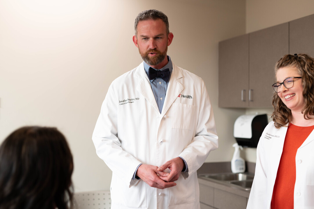 Gastrointestinal team talk with patient. 