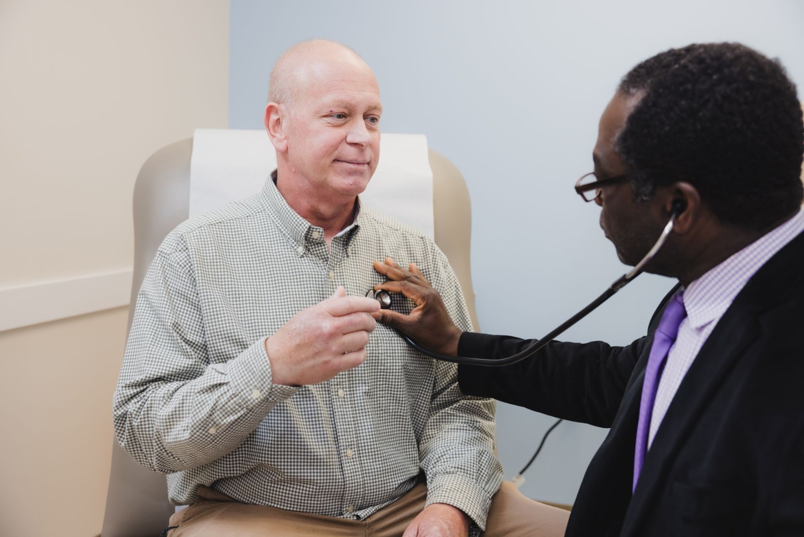 Physician examines a patient. 