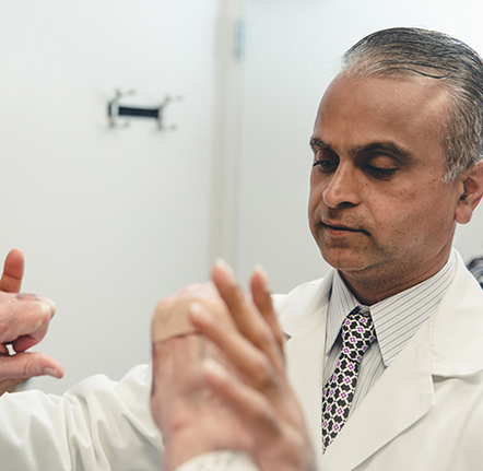 Dr. Ahmad meets with a patient