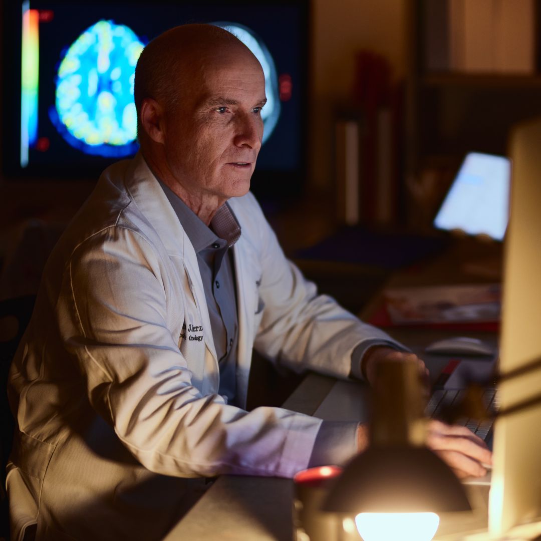 Gynecologic oncology provider looks at a monitor. 