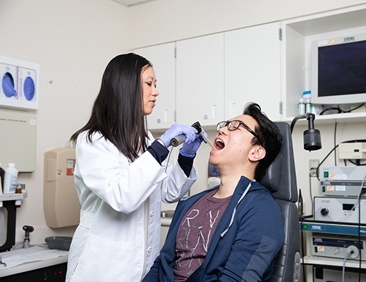 Physician examines a patient. 