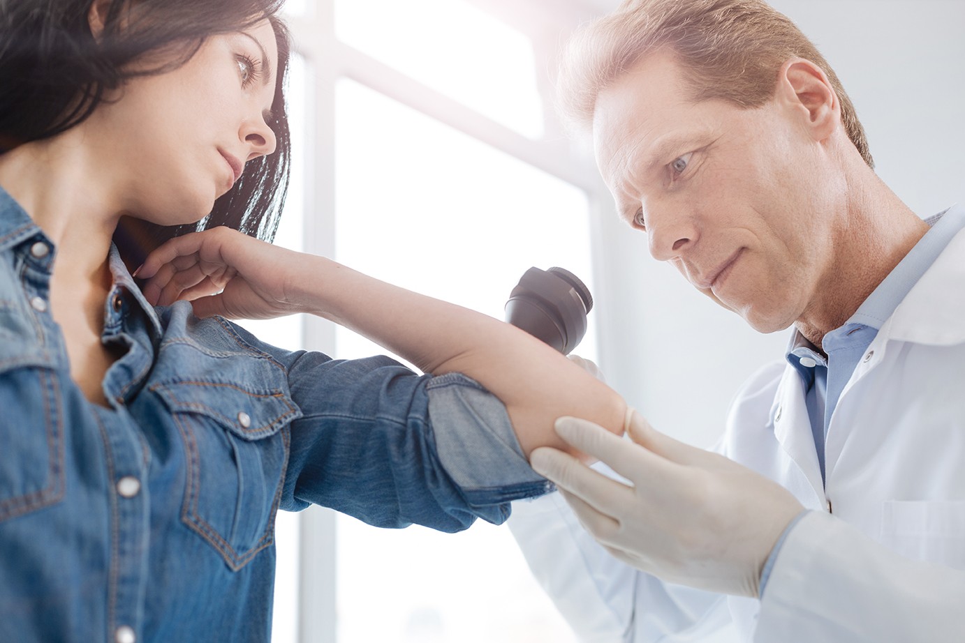 Physician attends to a patient. 