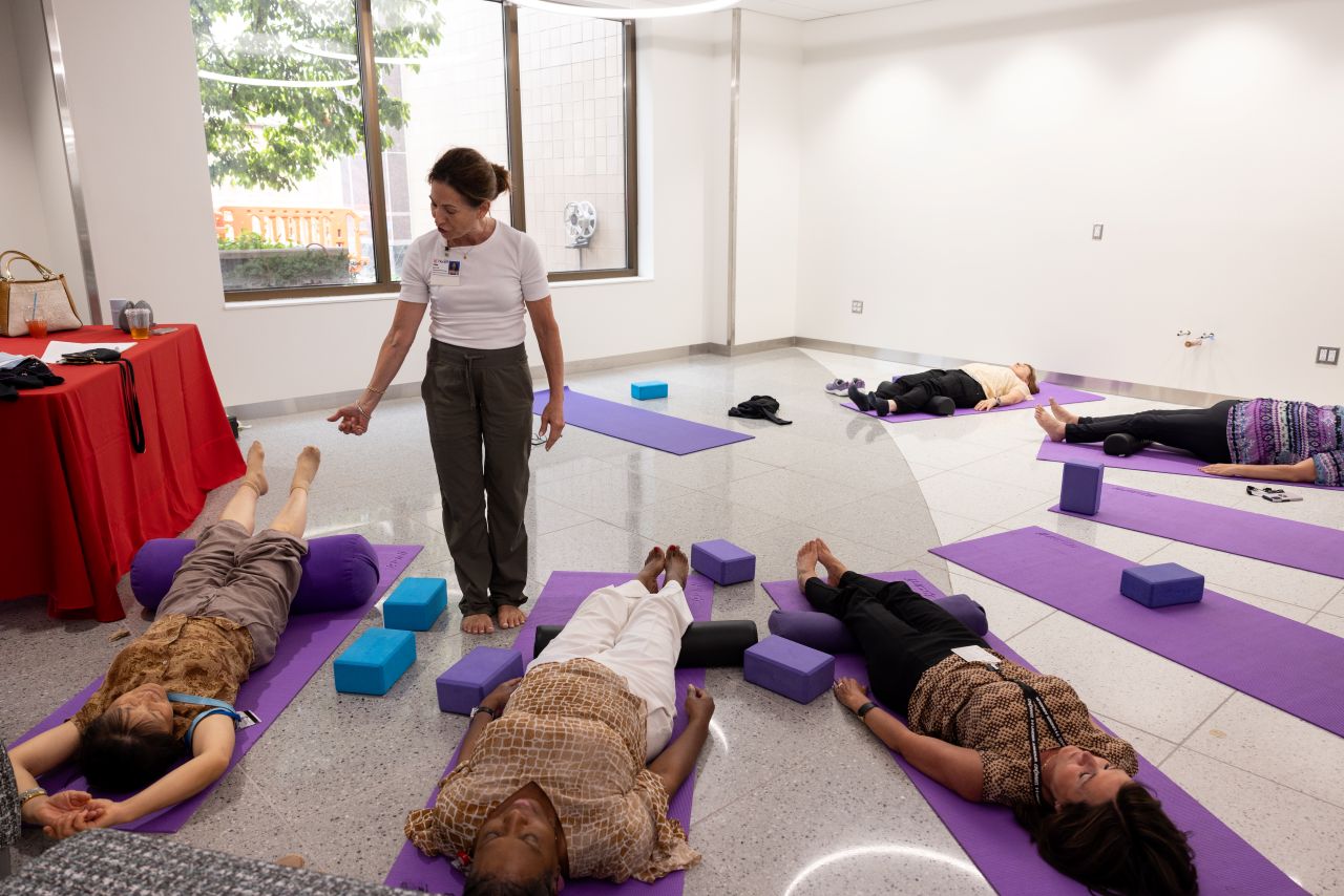 People attend group wellness class. 