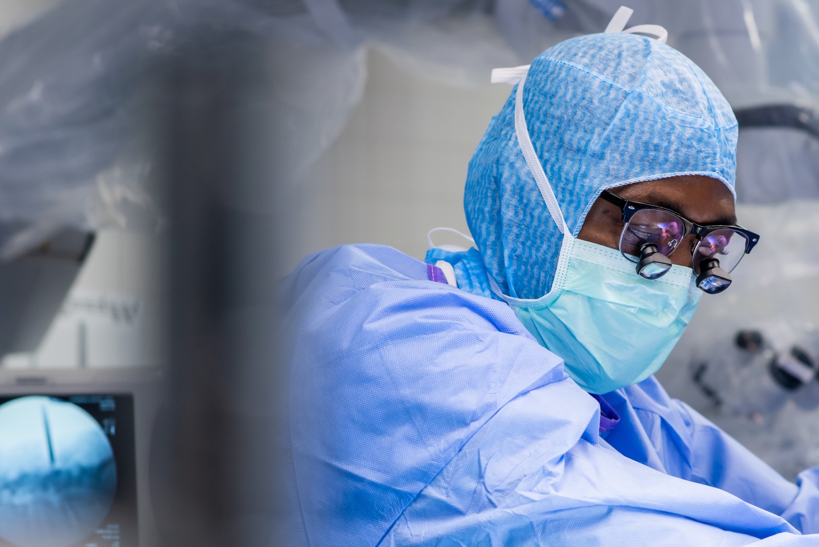 Dr. Adogwa in the operating room at University of Cincinnati Neuroscience Institute in Cincinnati, Ohio