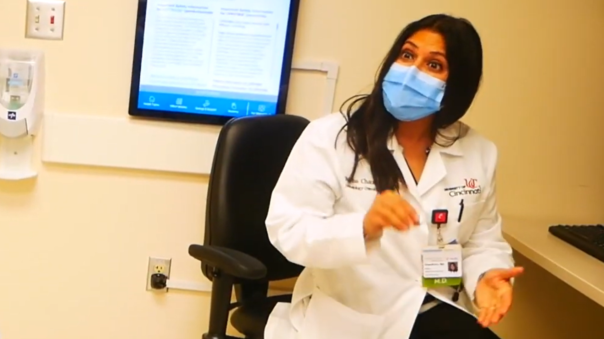 Patient meets with physician during appointment at UC Health