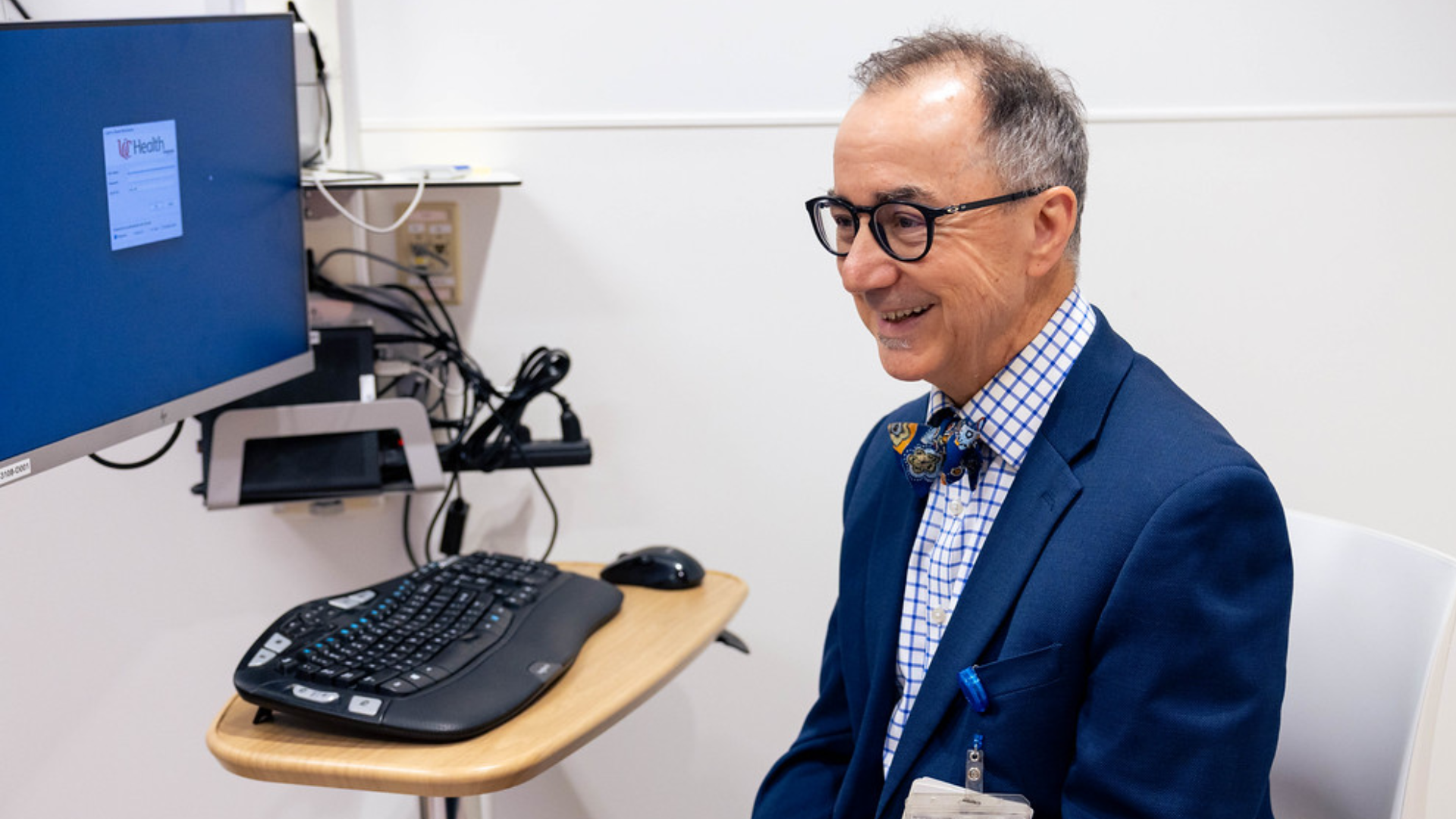 Dr. Privitera and patient discuss epiliepsy treatments at the UC Health Epilepsy Center in Cincinnati, Ohio