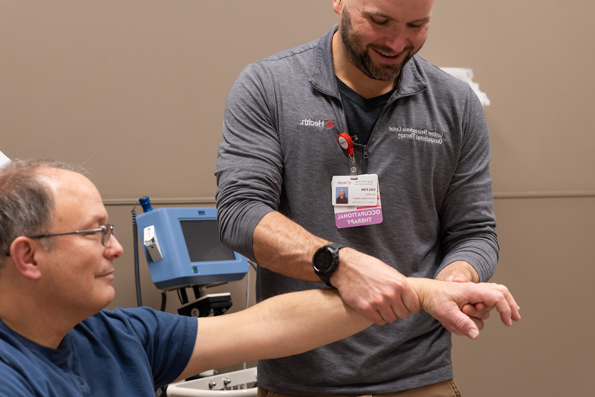 Care provider at UC Health meets with a patient