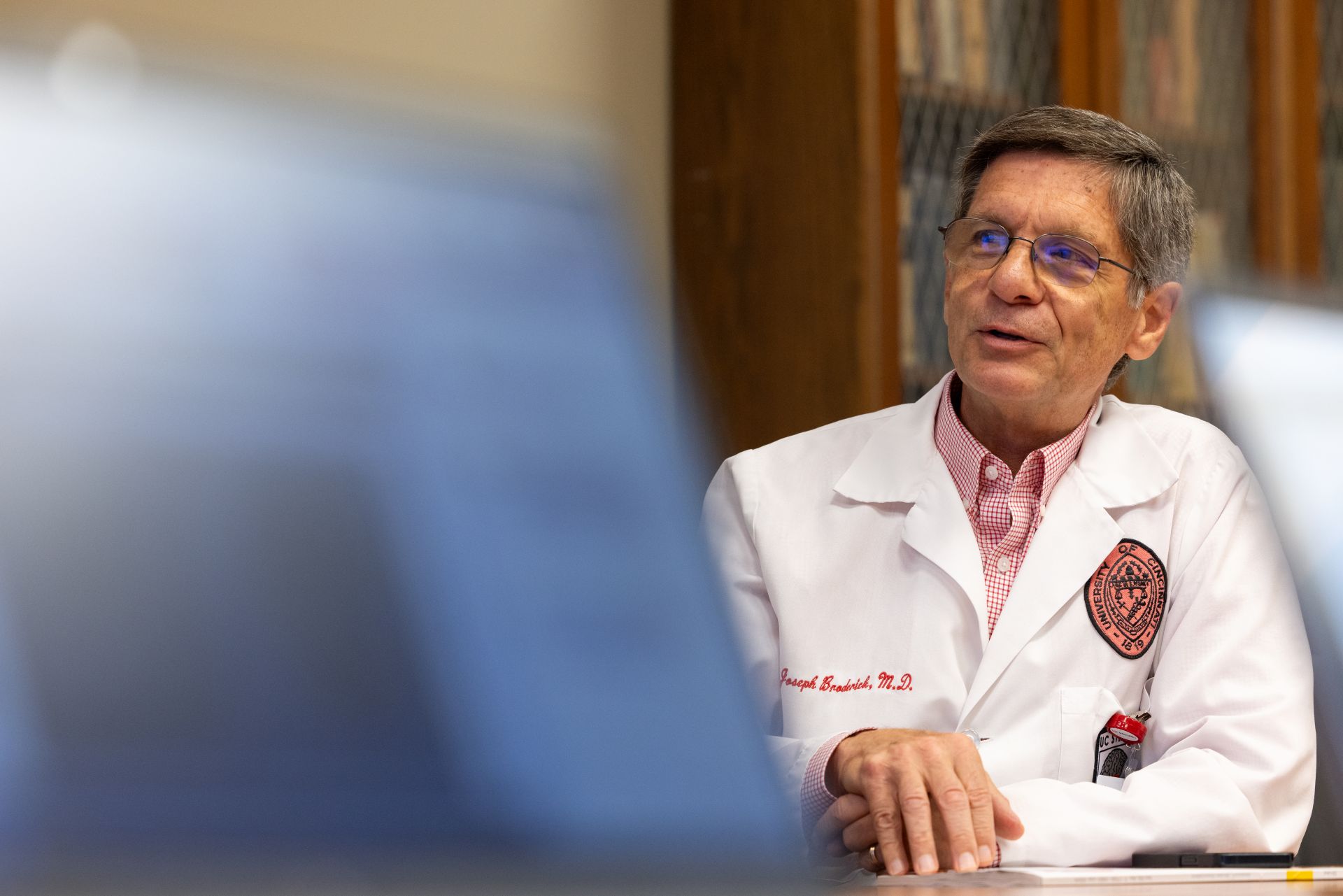 Physician talking during a meeting. 