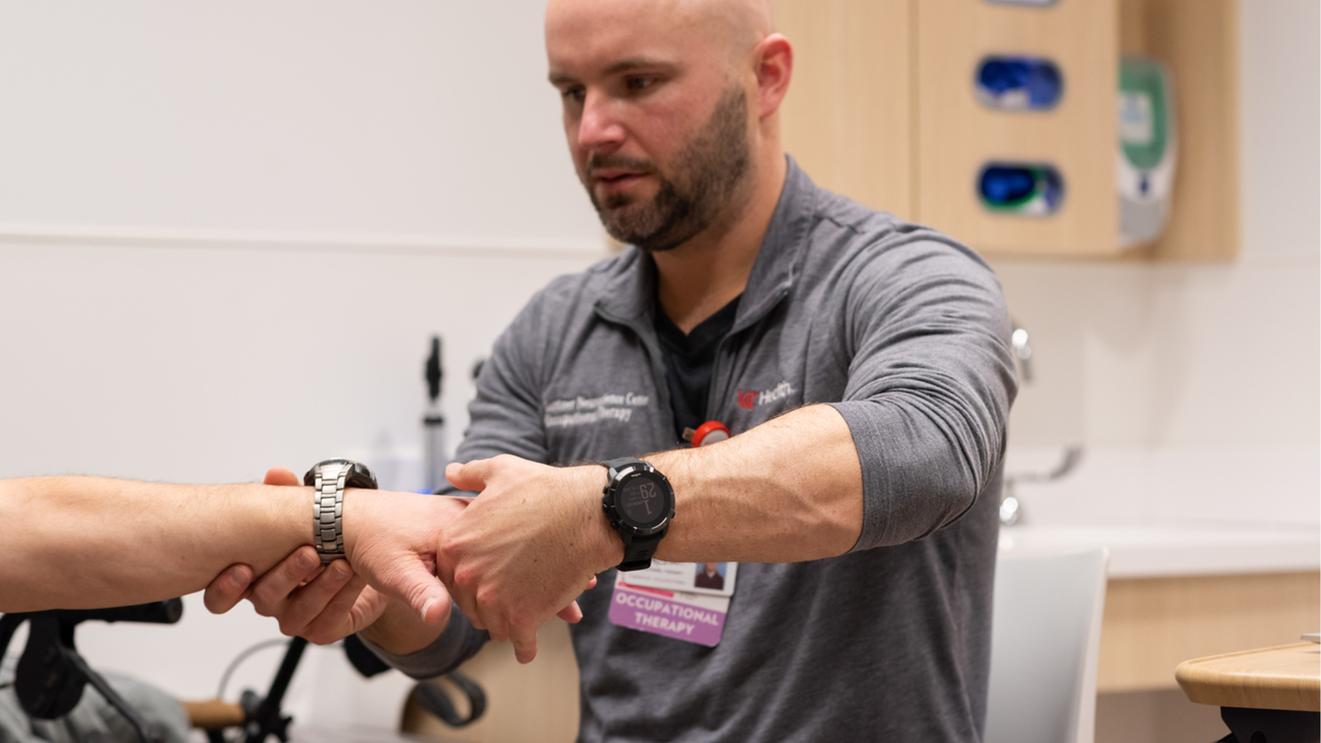 Occupational therapist works with a patient
