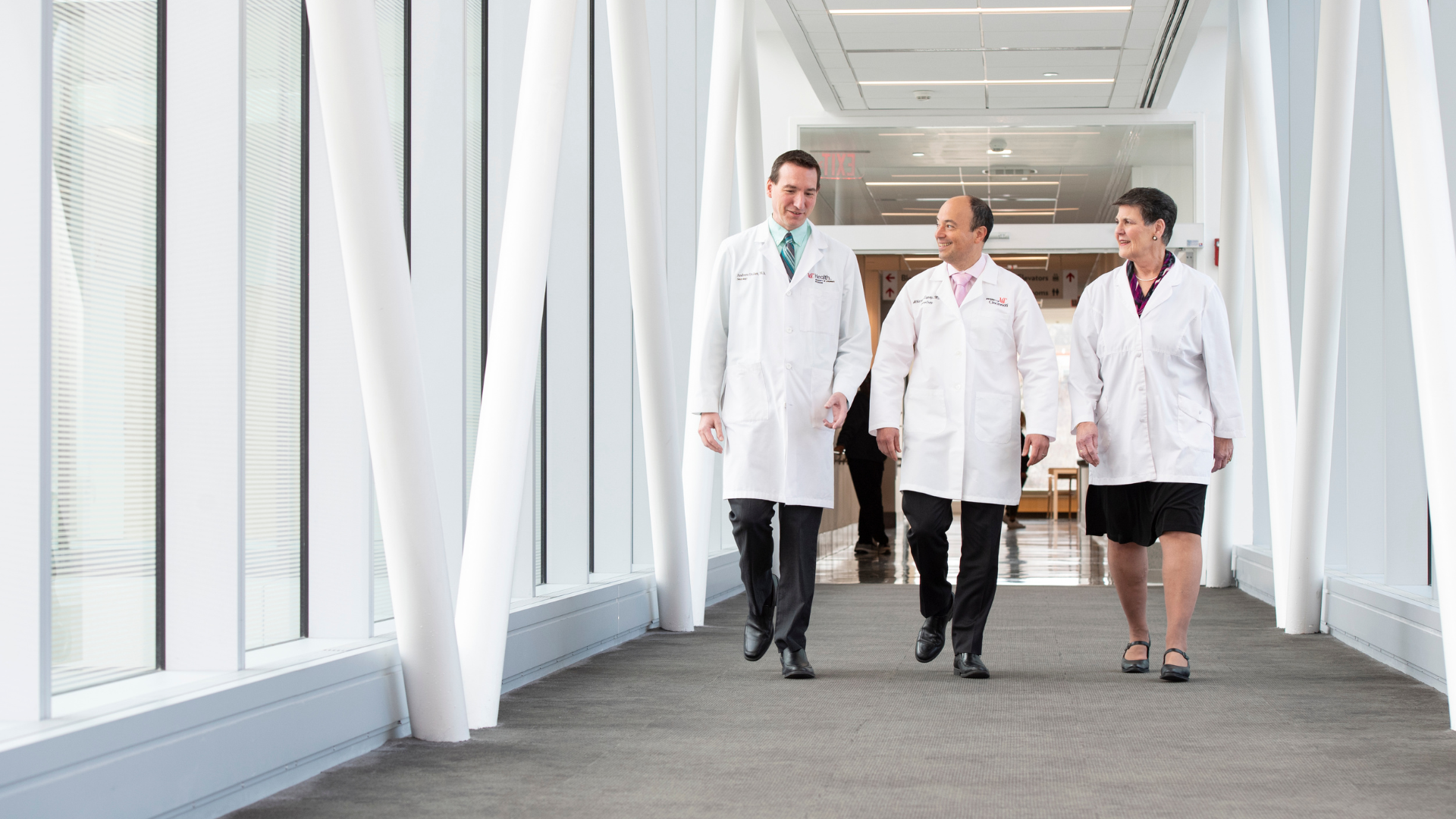 UC Health Providers walk down hallway at UCGNI in Cincinnati