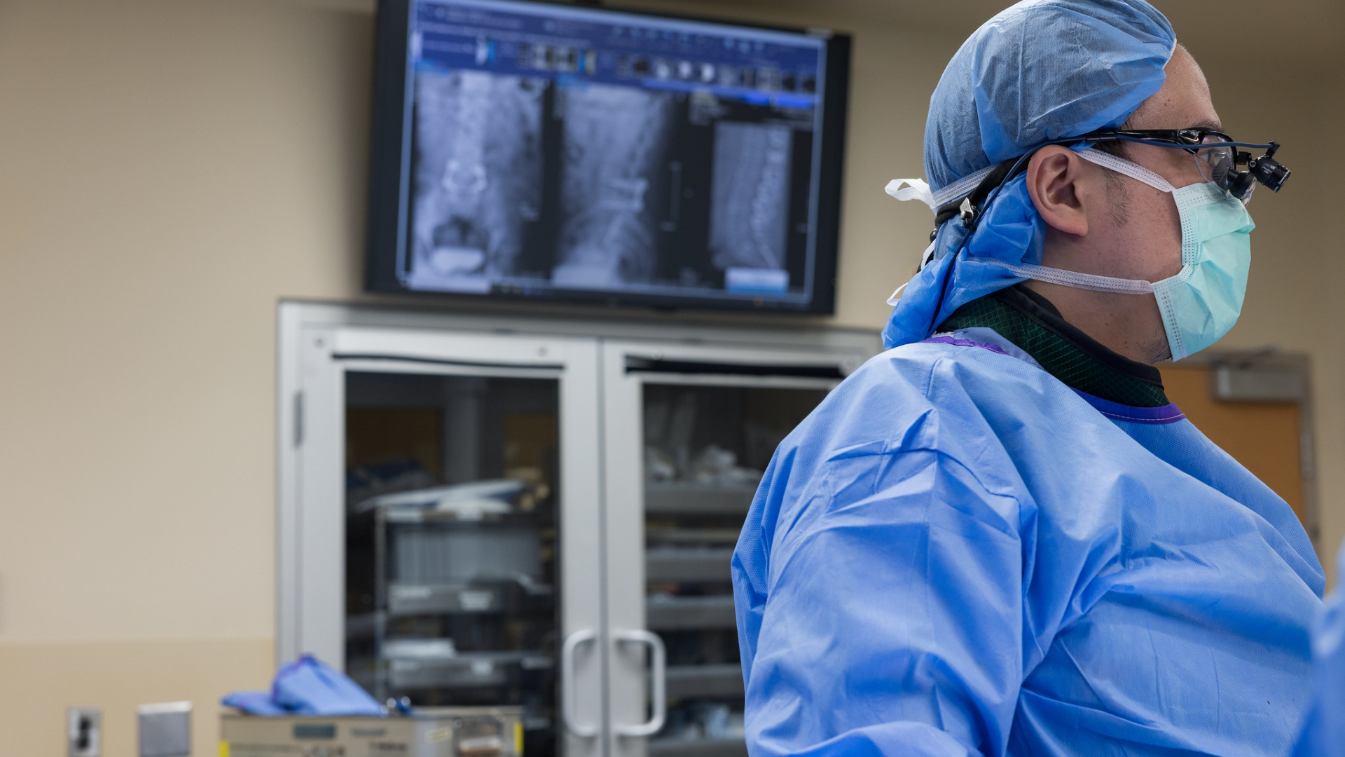 Spine surgeon at UC Health in Cincinnati, Ohio in the operating room