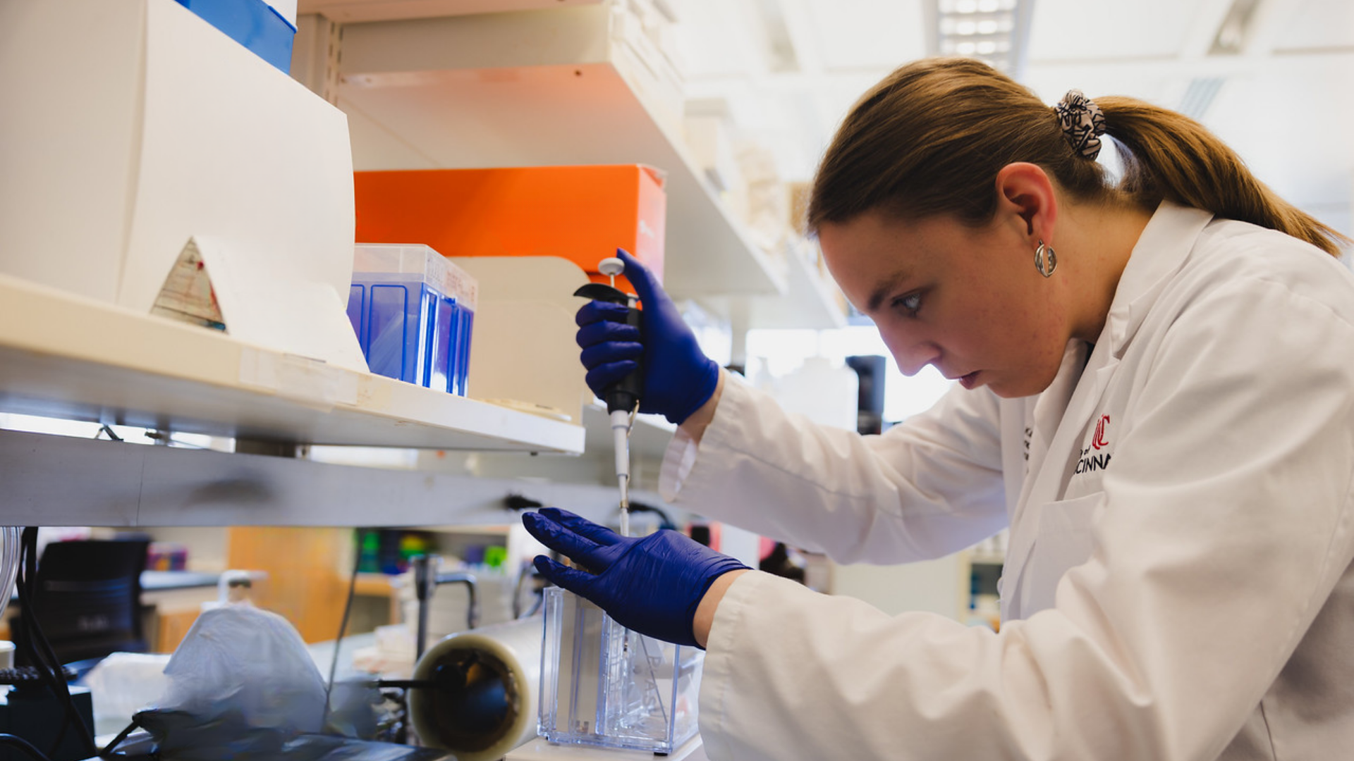 UCGNI Brain tumor researcher in lab