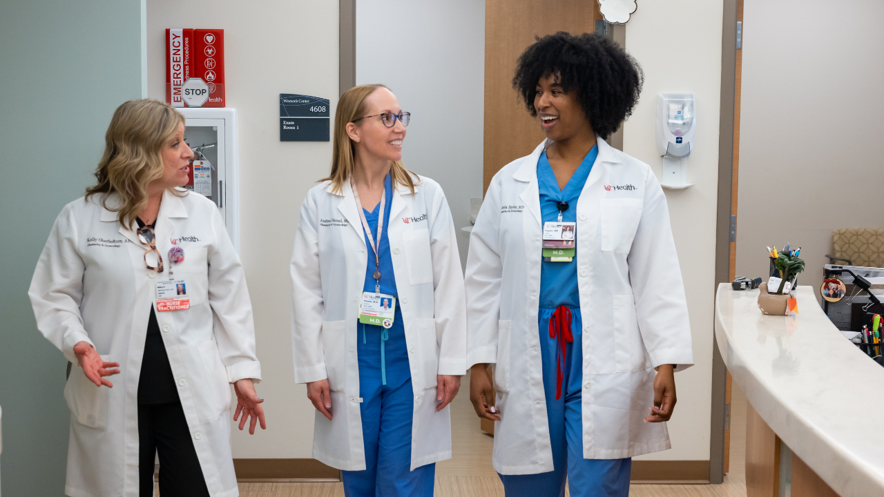 Gynecologists walking down the hallway at UC Health