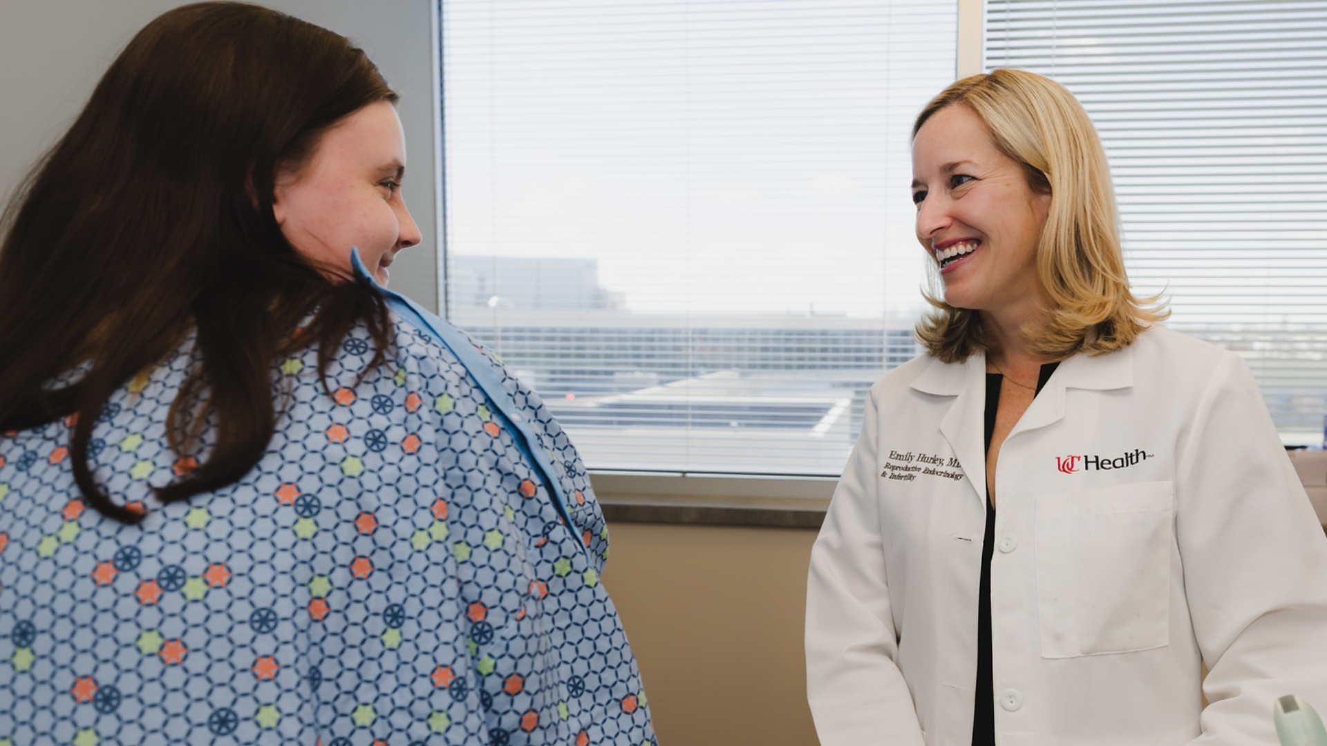 Dr. Hurley meets with a patient at UC Health's REI clinic