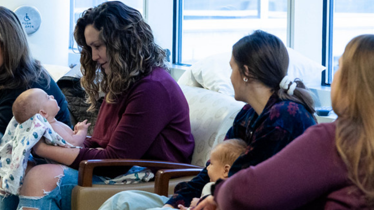 Parents sit with their babies at a Baby Café group at West Chester Hospital in West Chester, Ohio.