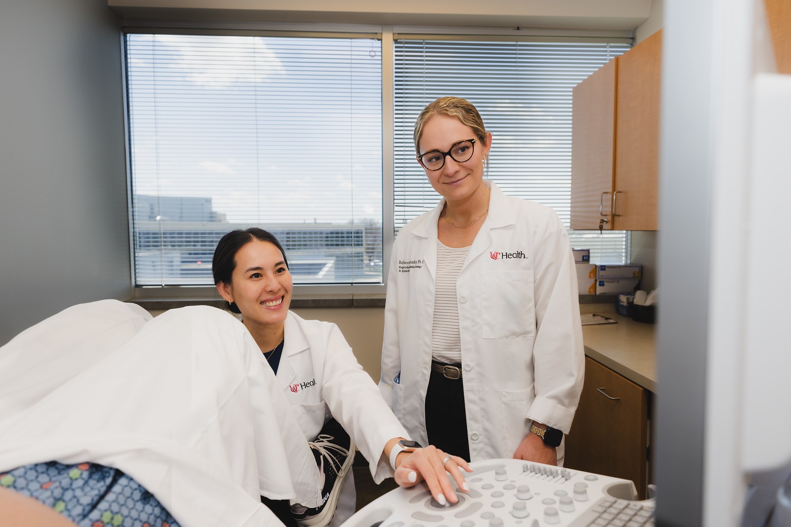 UC Health providers conduct an exam on a patient