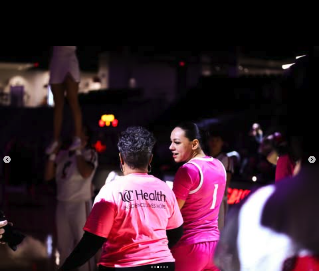 UC Health women's basketball team wears pink for breast cancer awareness.