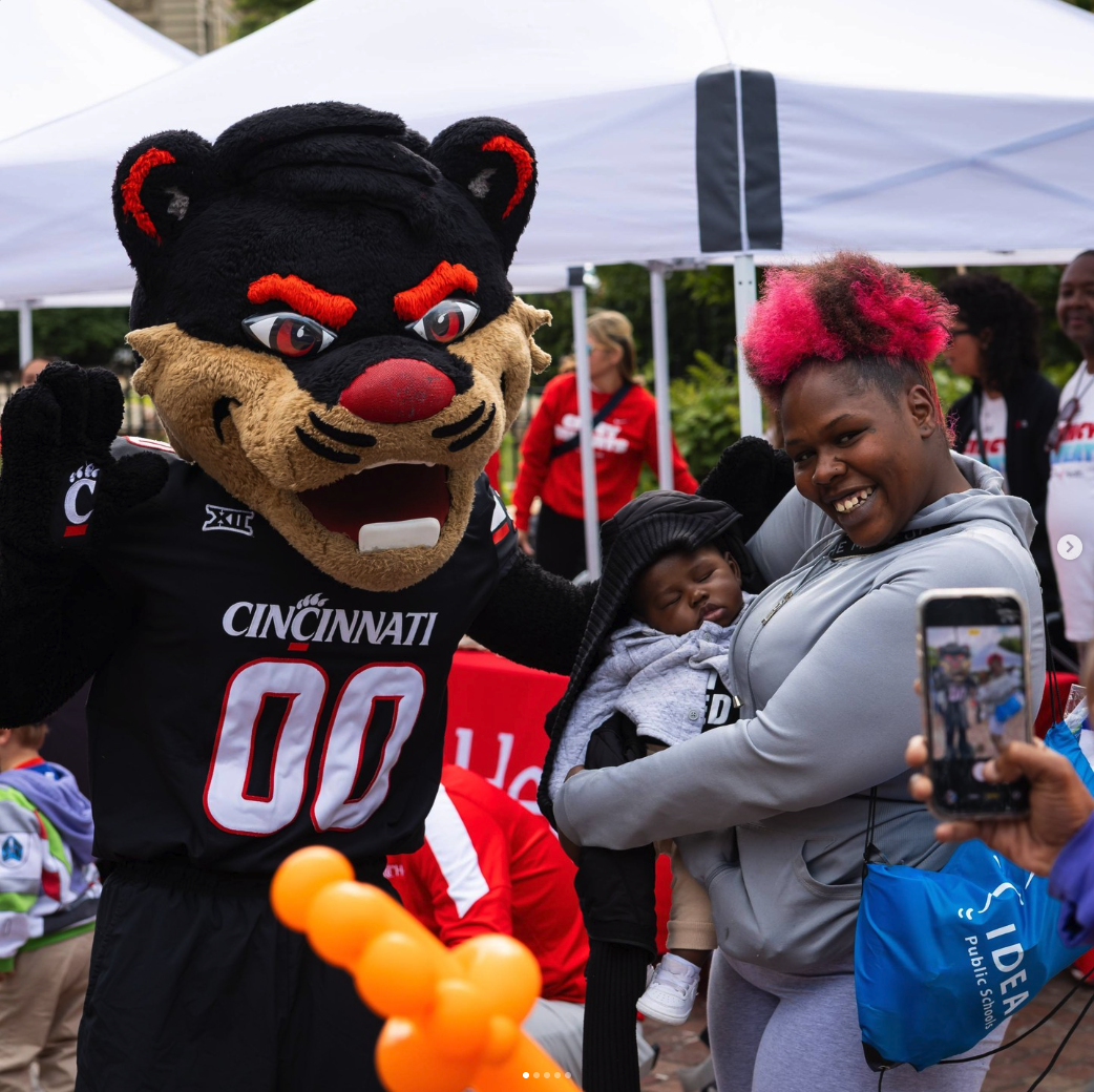 Baby Bearcat and mom with the University of Cincinnati Bearcat.