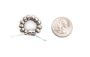 The LINX System is a small, flexible band of magnets enclosed in titanium beads.