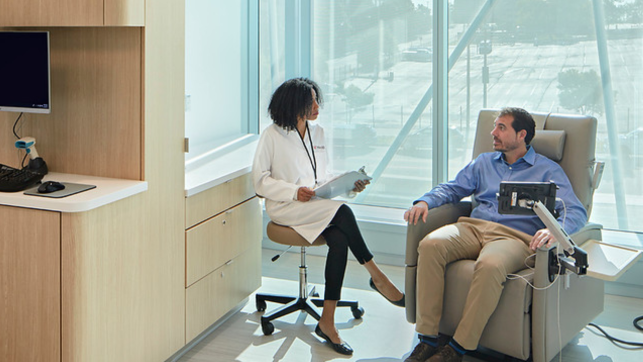 UCGNI physician and patient meeting in clinical setting